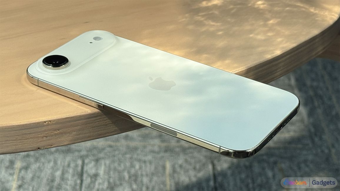 shot of the iPhone Air placed face down on a wooden surface shot of the iPhone Air placed face down on a wooden surface