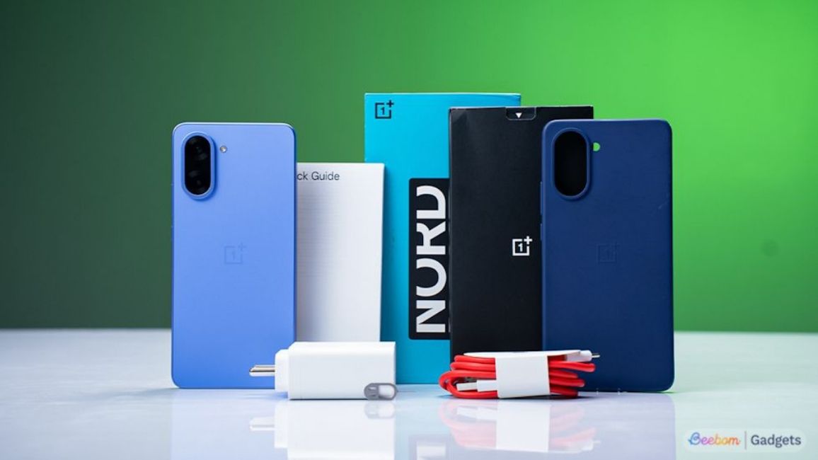 shot of the OnePlus Nord CE 5 alongside other box contents placed on a desk shot of the OnePlus Nord CE 5 alongside other box contents placed on a desk