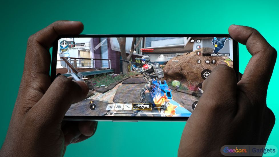 Person holding CMF Phone 2 Pro horizontally playing call of duty mobile