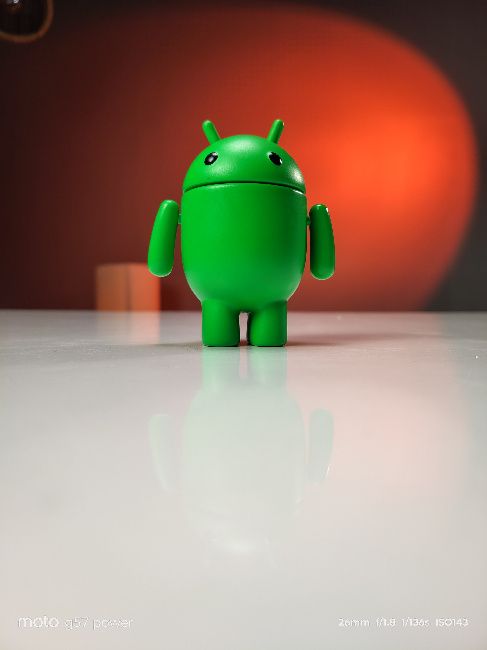 Moto G57 power main camera image of Android figurine
