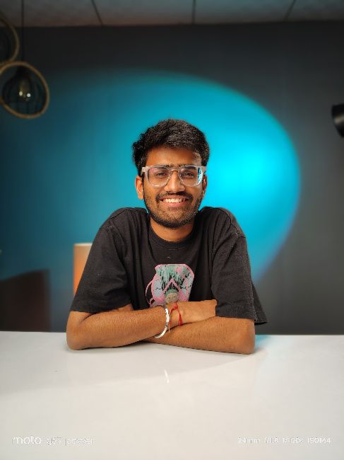 Moto G57 power main camera image of person in black shirt