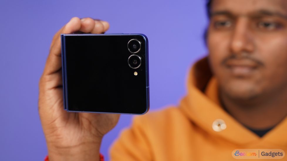 Samsung Galaxy Z Flip 7 in camcorder mode held by a person