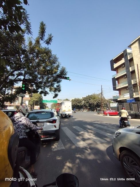 Moto G57 power Ultra-wide shot of city road