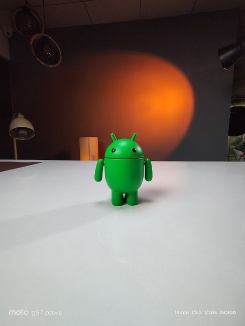 Moto G57 power Ultra-wide shot of Android toy