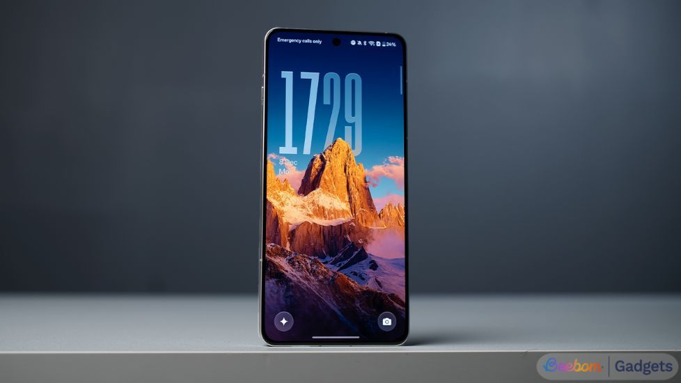 OnePlus 13R on a table with dynamic lock screen clock