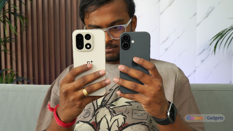 Person holding a OnePlus 15 and iPhone 17 in hands Person holding a OnePlus 15 and iPhone 17 in hands
