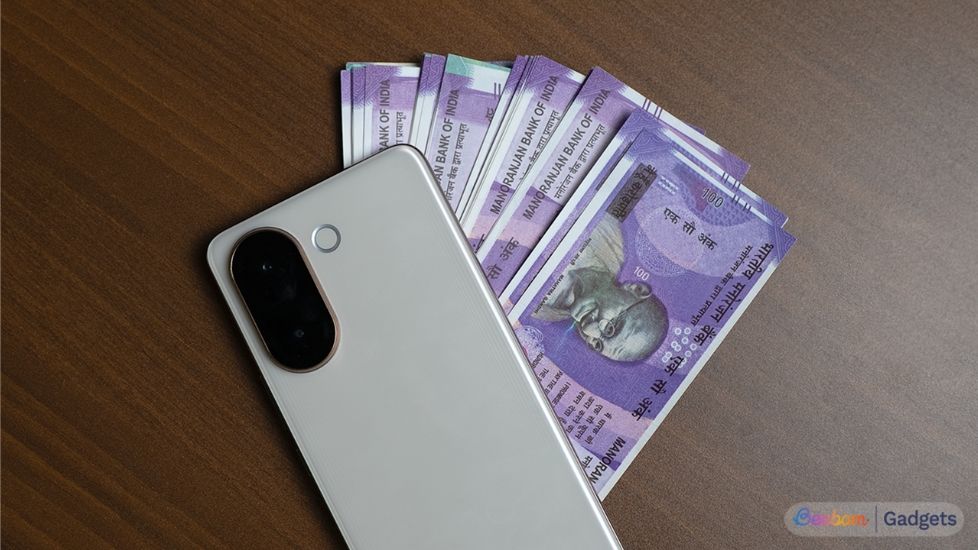 Smartphone with Indian rupees under the screen
