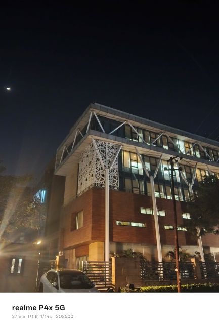 Realme P4x main photo a building at night Realme P4x main photo a building at night