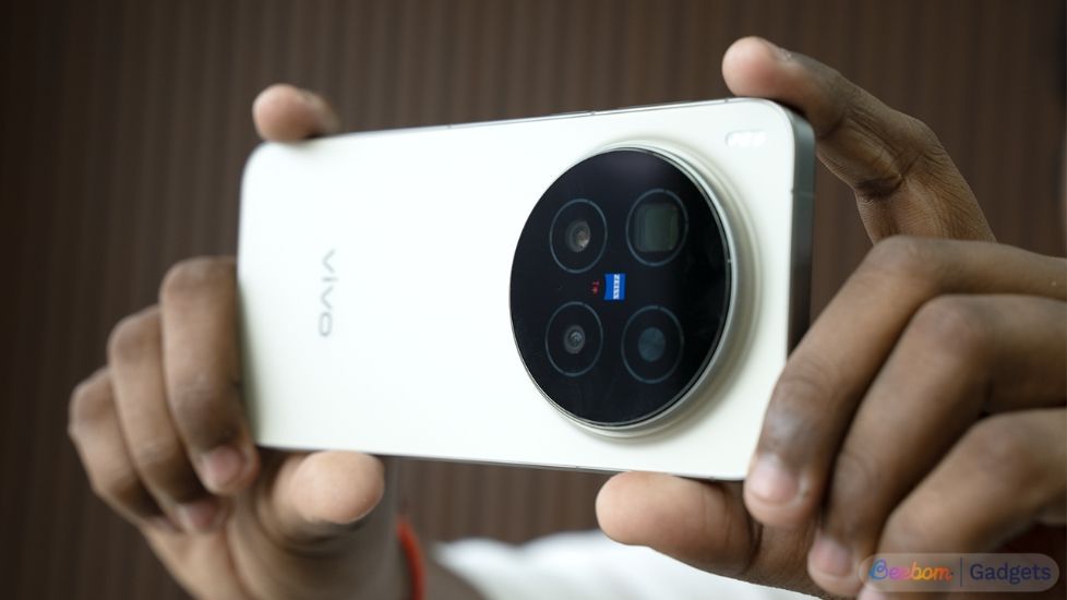 Person holding a Vivo X300 to capture an image