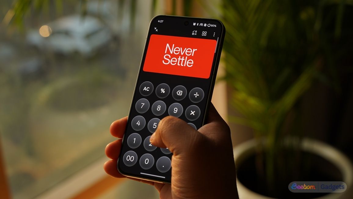 OnePlus 13s calculator app shown in hands OnePlus 13s calculator app shown in hands