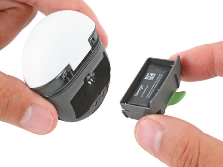 shot of hands interacting with different parts of a Google Pixel Buds case shot of hands interacting with different parts of a Google Pixel Buds case