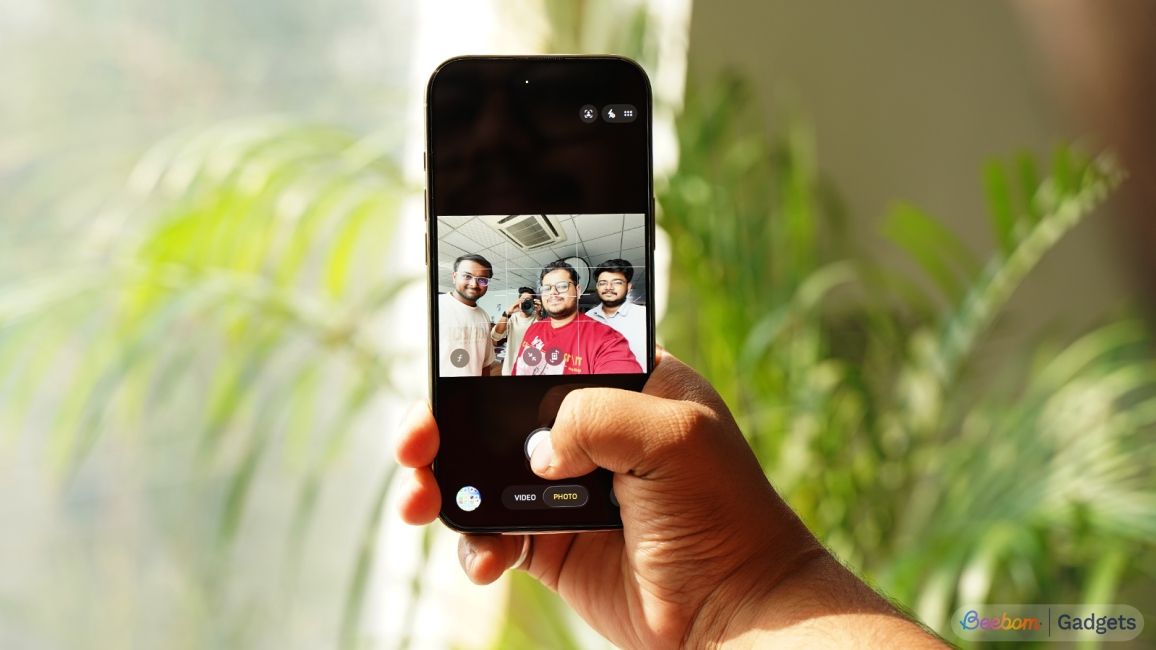 shot of a hand holding the iPhone 17 showing the Centre Stage camera in action shot of a hand holding the iPhone 17 showing the Centre Stage camera in action
