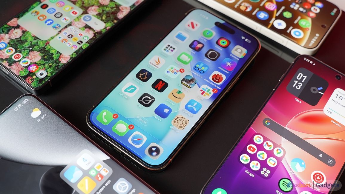 Apple iPhone surrounded by Android phones