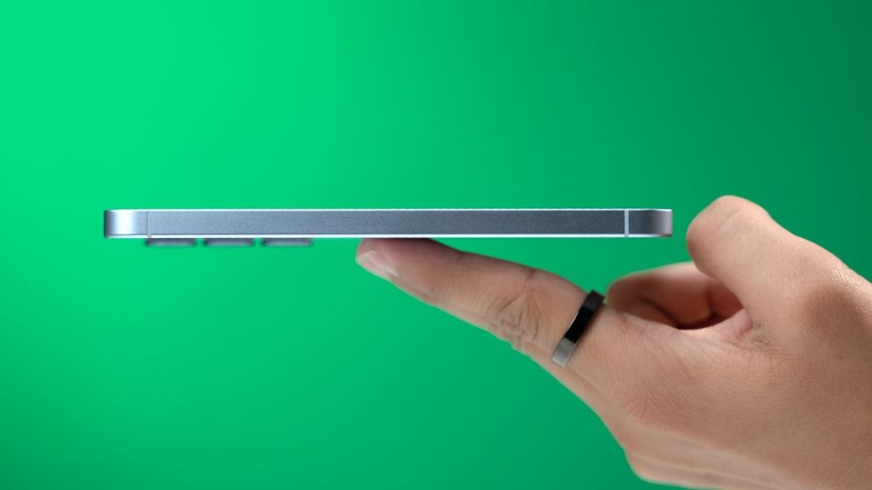 Android smartphone on a finger