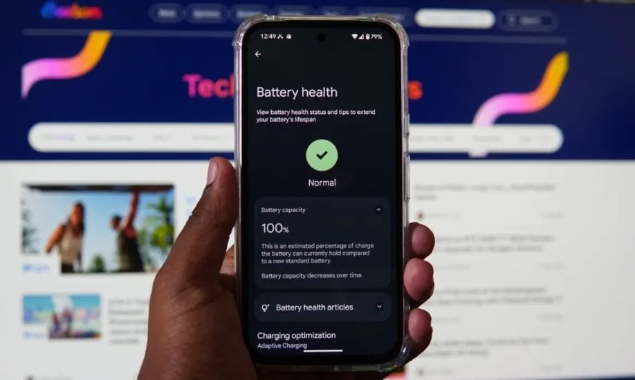 Pixel 8a in hand with battery health