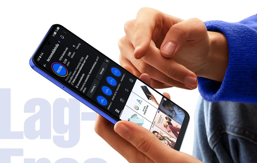 Tecno Spark Go 3 in hand while using it