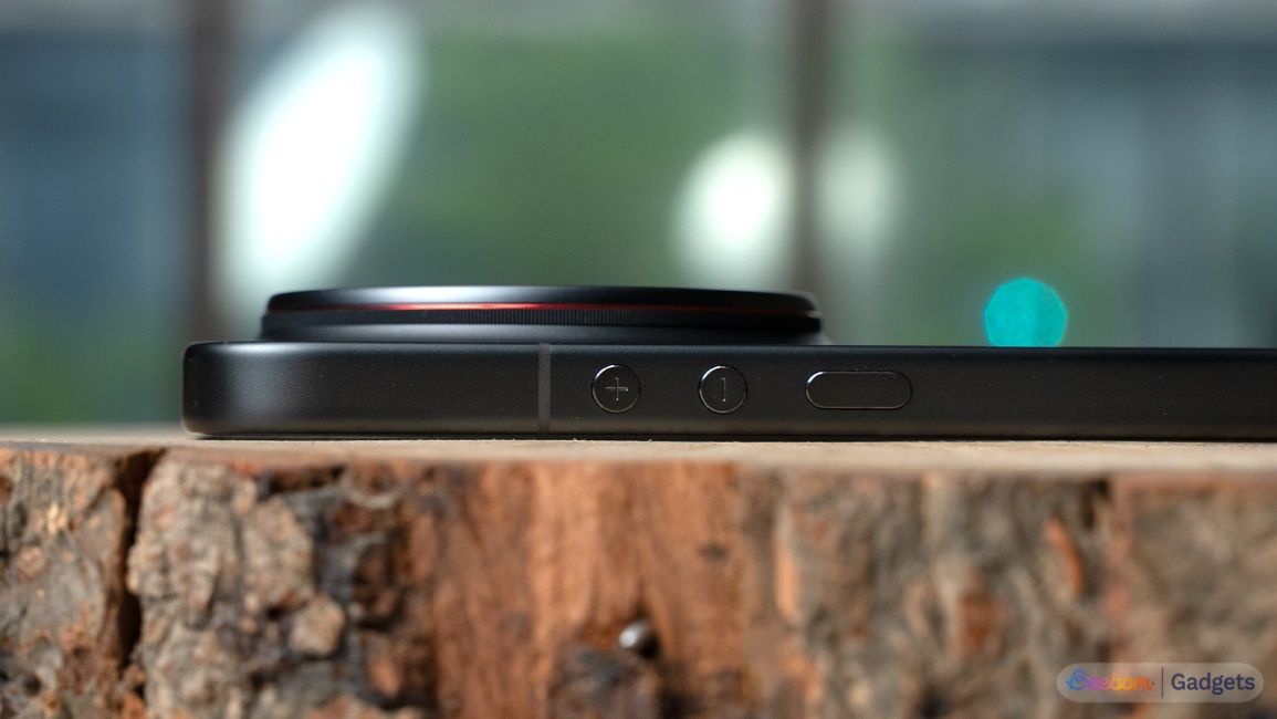 Xiaomi 17 Ultra shot from the side laying on a wooden surface