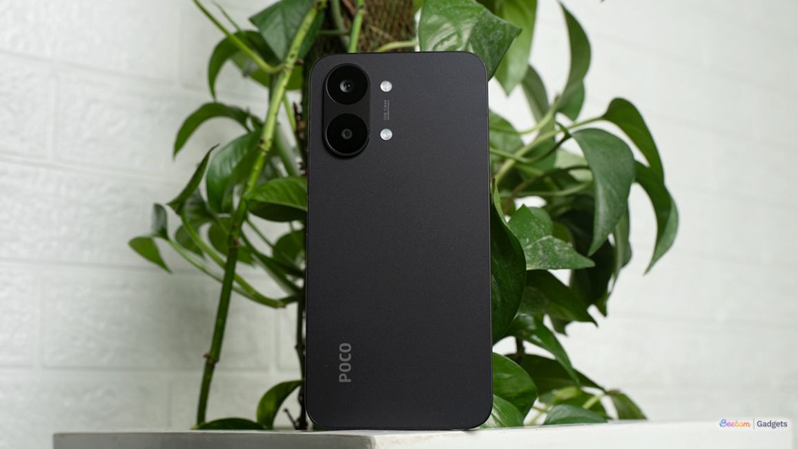 Poco X8 Pro Max back panel full design showcased with a plant in the background