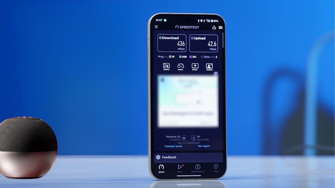 oneplus 15 showing 5g speed test metrics, blue background