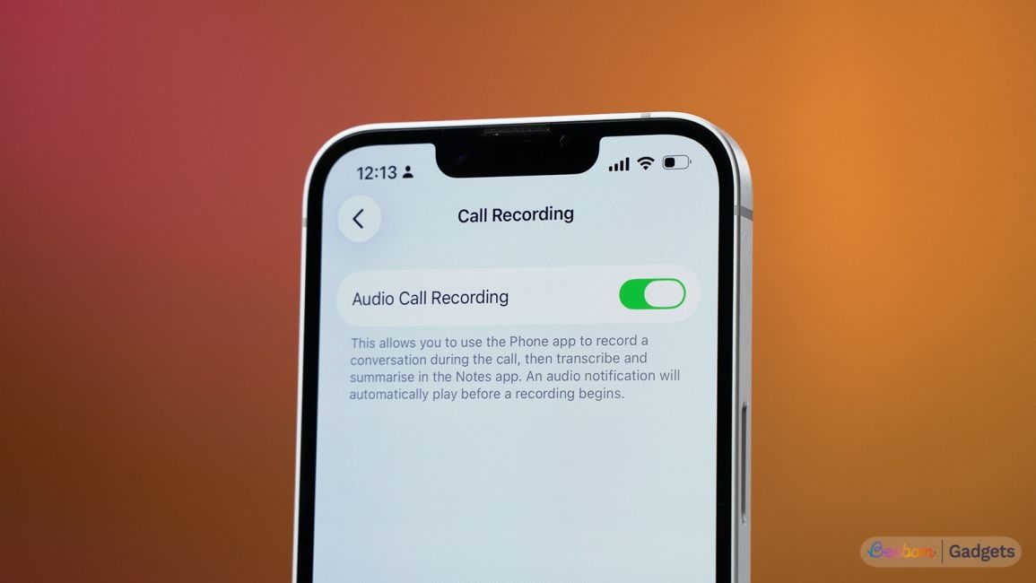 Call Recording setting show on an iPhone screen against an orange background