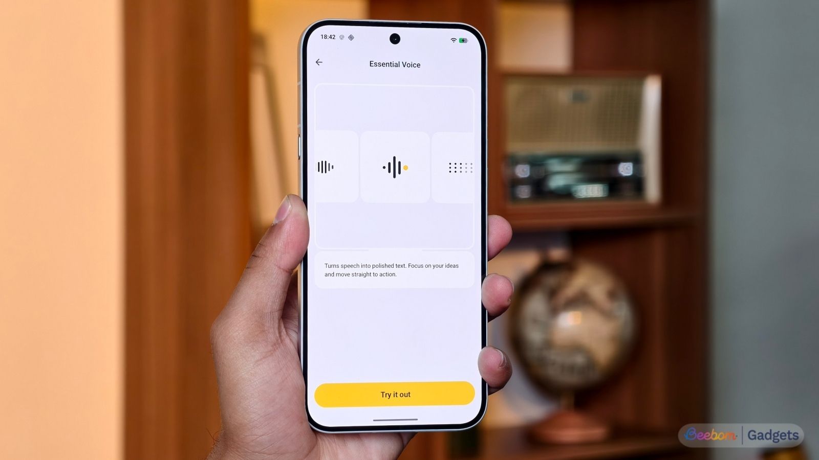 shot of a hand holding the Nothing Phone (4a) Pro showing the Essential Voice feature in action