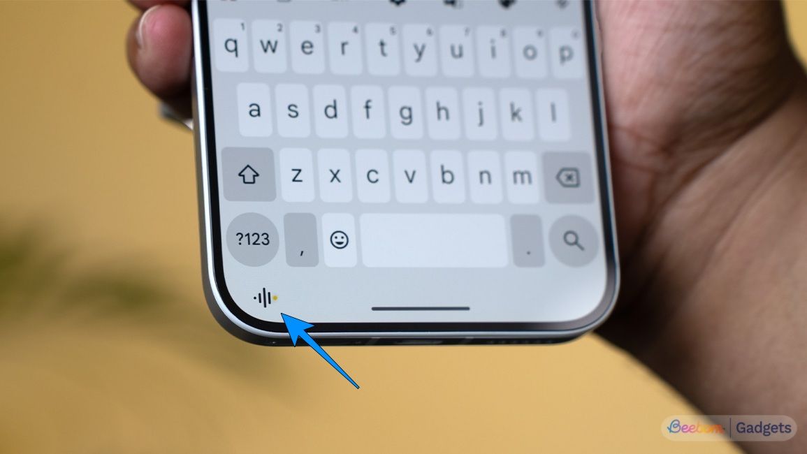 Nothing Essential Voice Feature showcased below the keyboard with a blue arrow pointing towards it