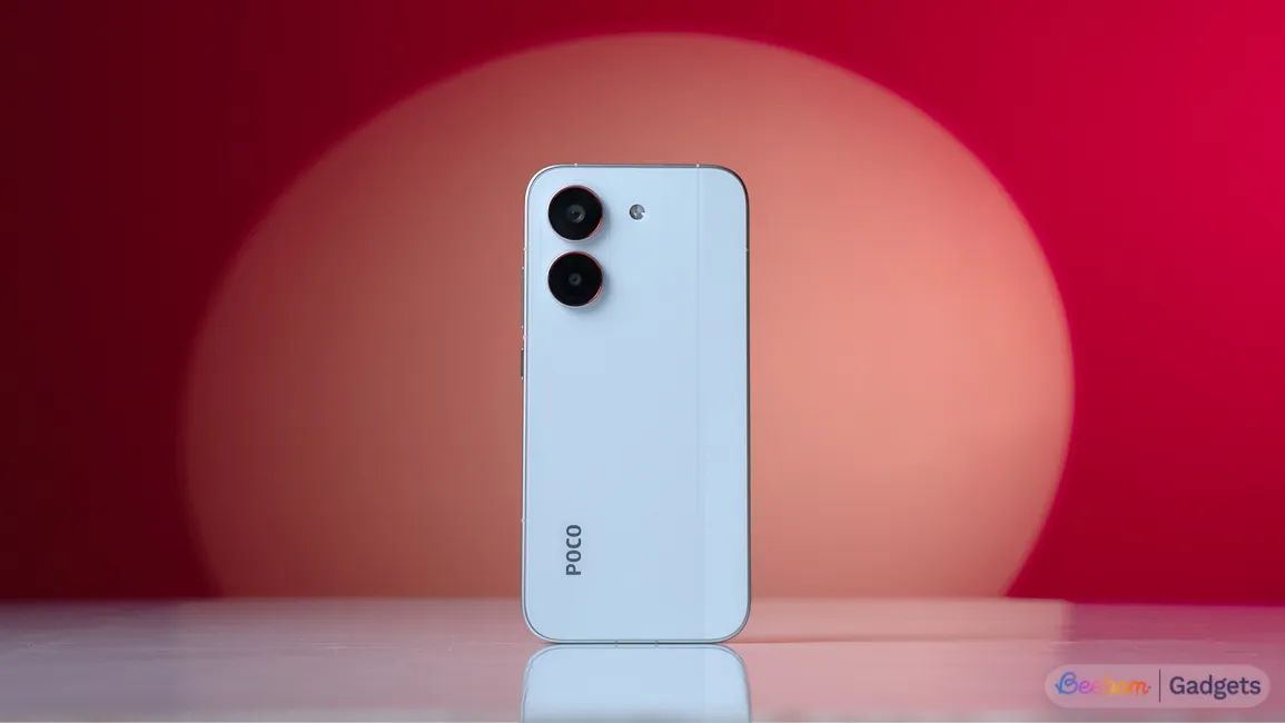 poco x8 pro standing against a red background