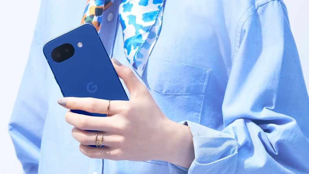 Google Pixel 10a held in hand in Isai Blue colourway