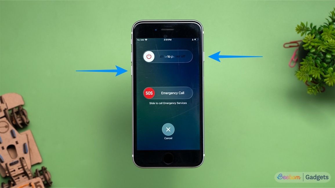 Press volume down and power button to force restart iPhone 7 Press volume down and power button to force restart iPhone 7