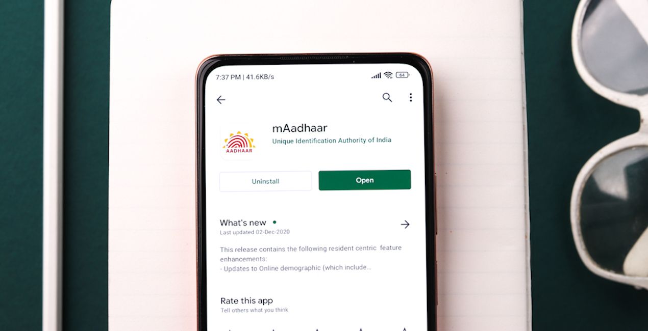 Aadhaar app on Google Play Store open on phone