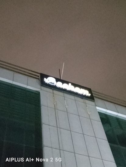 Ai+ Nova 2 5G Beebom logo nighttime shot
