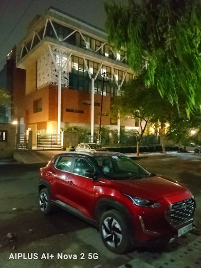 Ai+ Nova 2 5G building nighttime shot