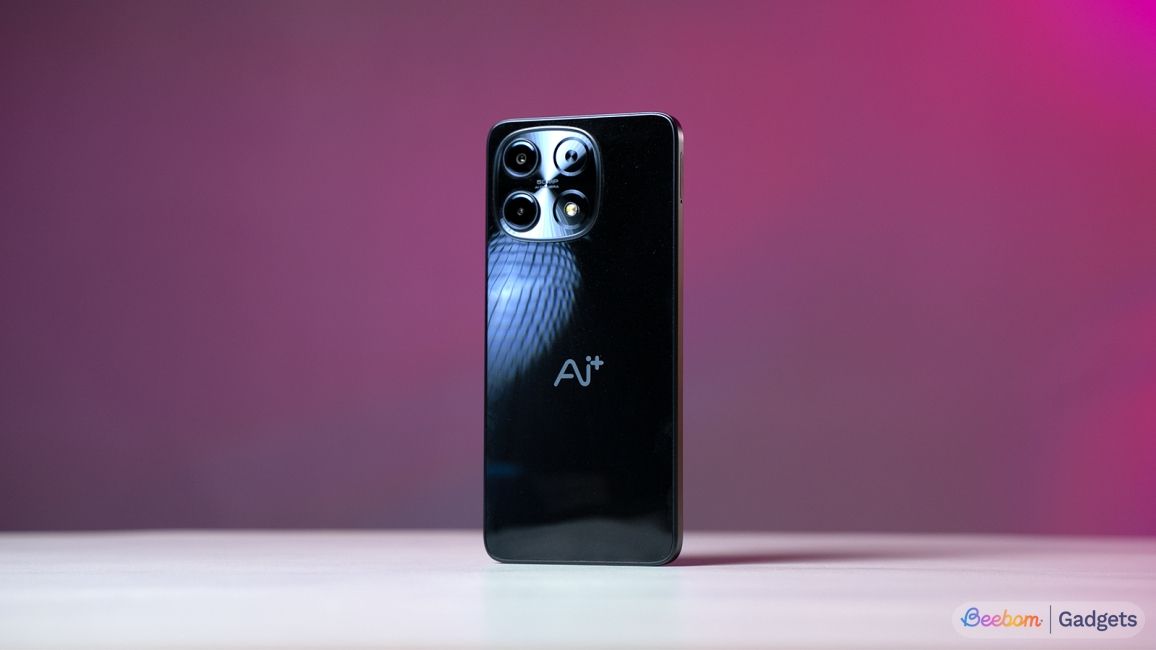 Ai+ Nova 2 5G black back design showcased in front of pink background