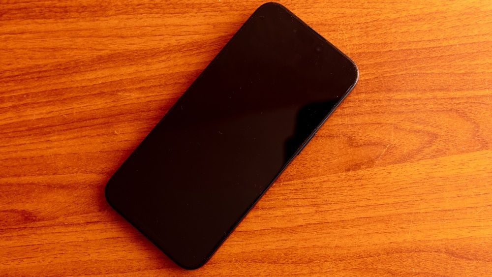a phone cooling down on a wooden table