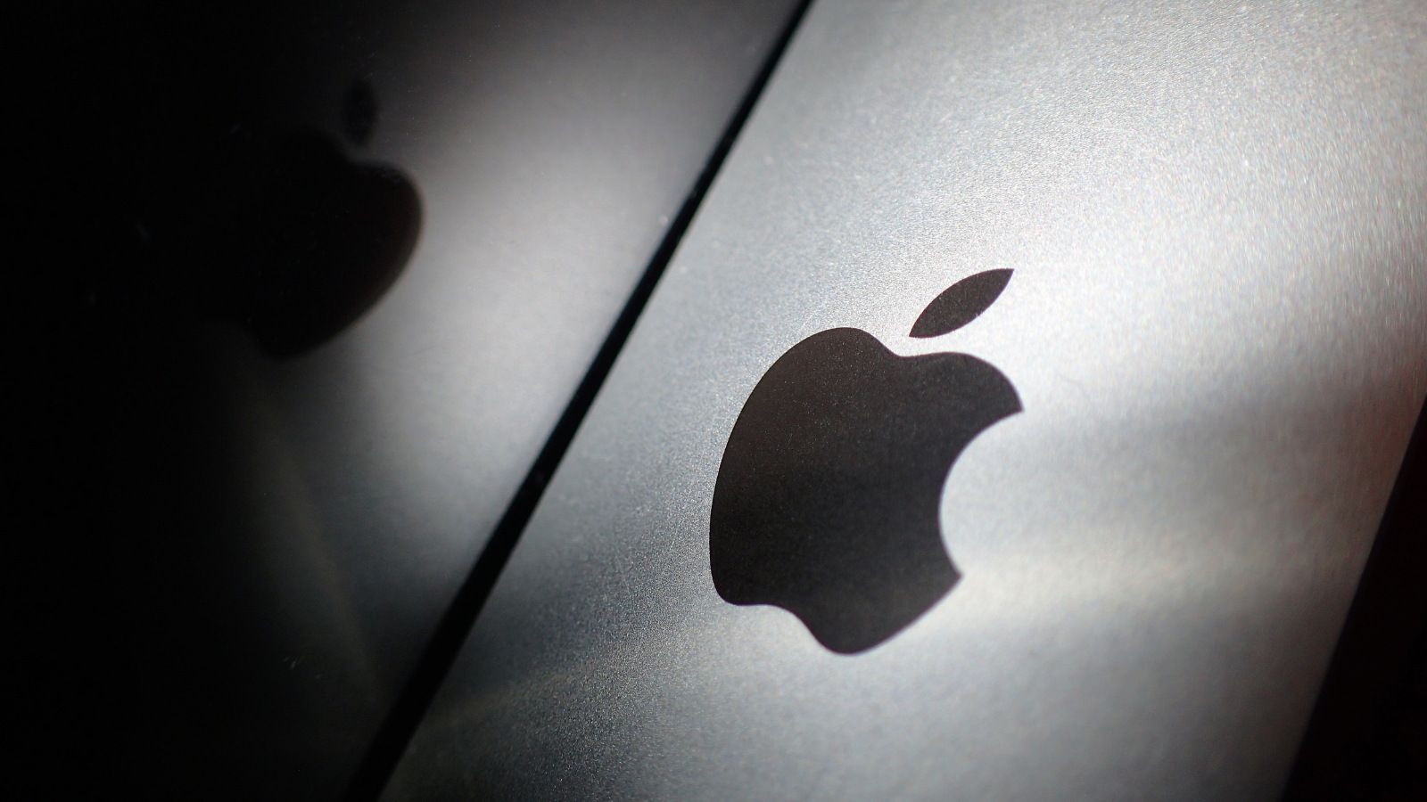 Apple logo on a device stock featured image Apple logo on a device stock featured image