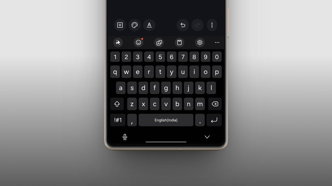 halfway image of a phone with samsung keyboard in dark mode