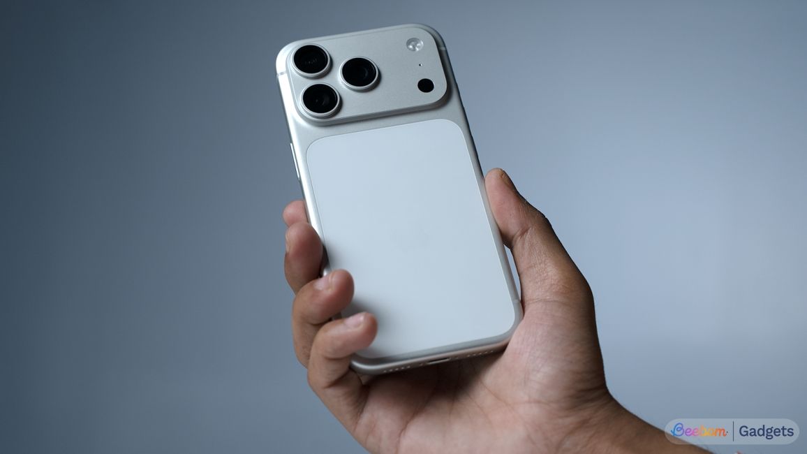 shot of a hand holding the iPhone 17 Pro Max in Silver colourway