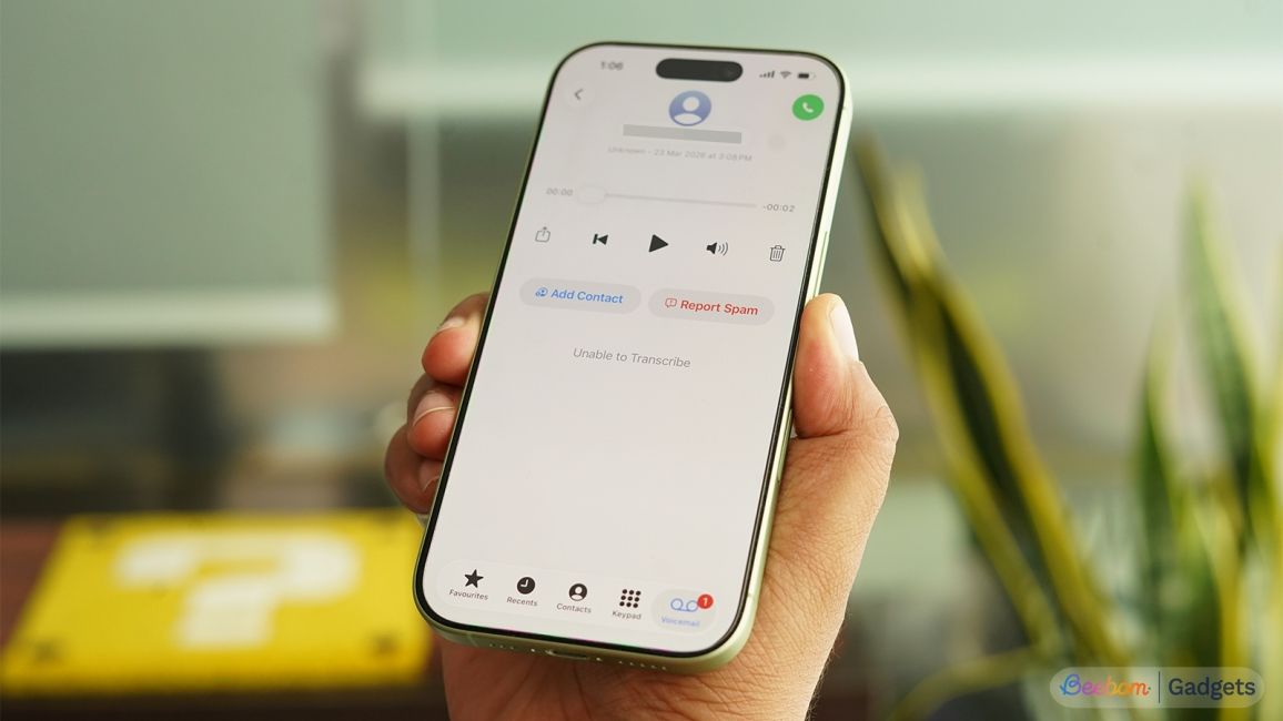 shot of a hand holding an iPhone showing a voicemail received