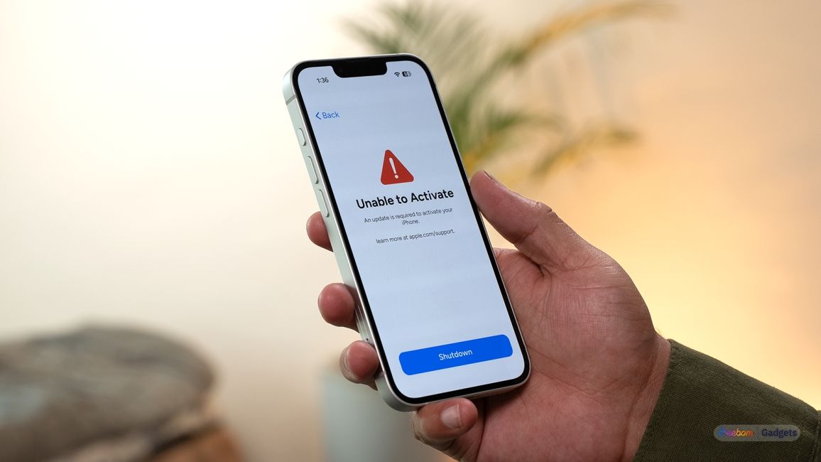 iPhone in hand showing unable to activate screen 