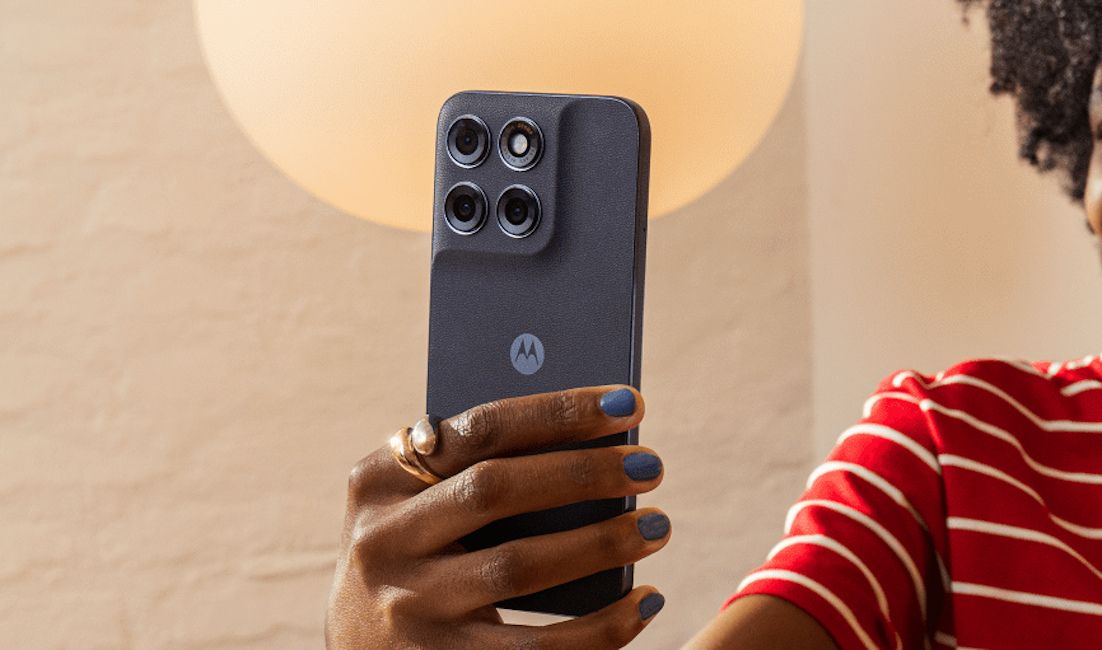 Moto g87 black back design showcased while in hand