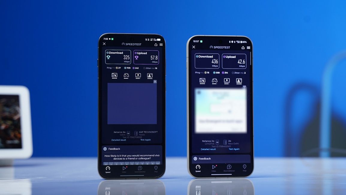 oneplus 15 and vivo x300 pro side by side and showing 5g speed test results on the screen