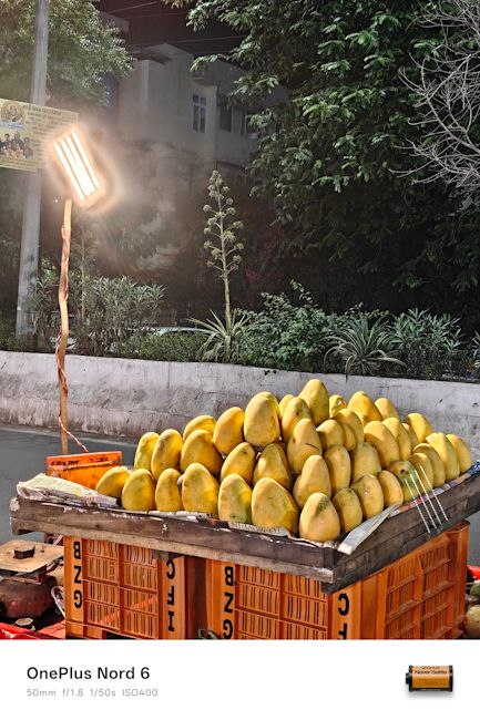 OnePlus Nord 6 50mm fruit stall night shot OnePlus Nord 6 50mm fruit stall night shot