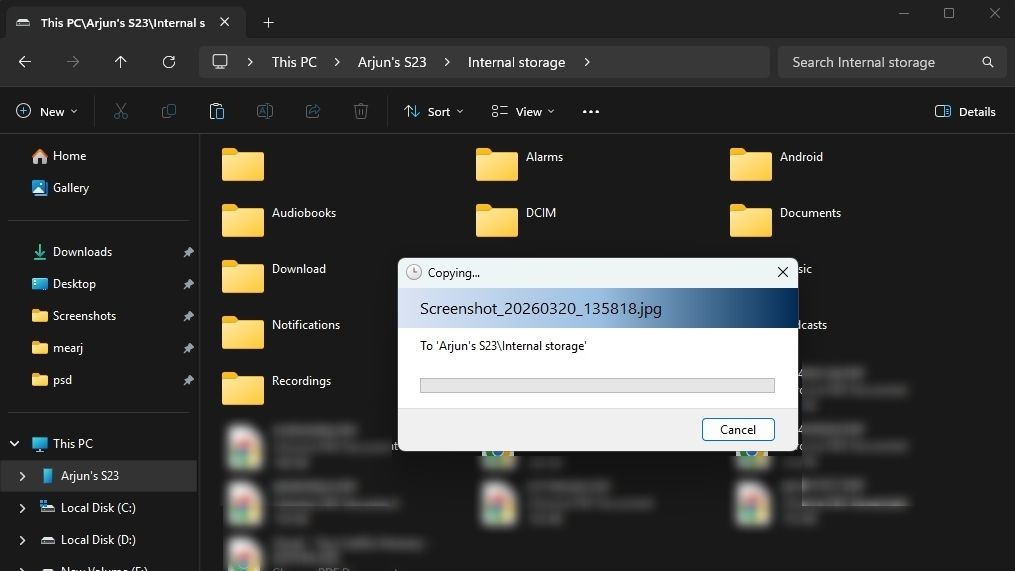 windows explorer showing file transfer between android and pc