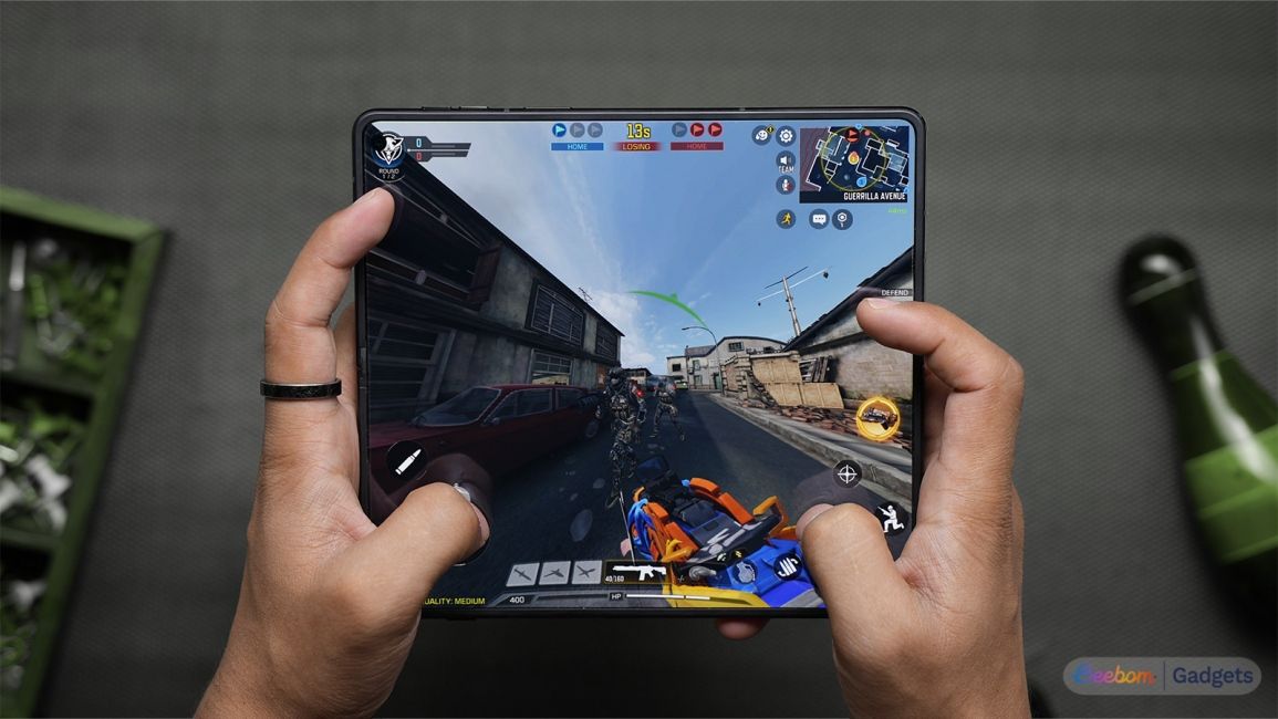 Gaming on the inner display of the Watching YouTube videos on the inner display of the Motorola Razr Fold 