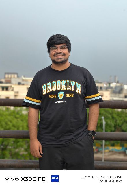 A person wearing a brooklyn tshirt 