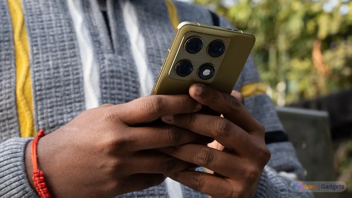 a person holding motorola signature phone, camera module visible