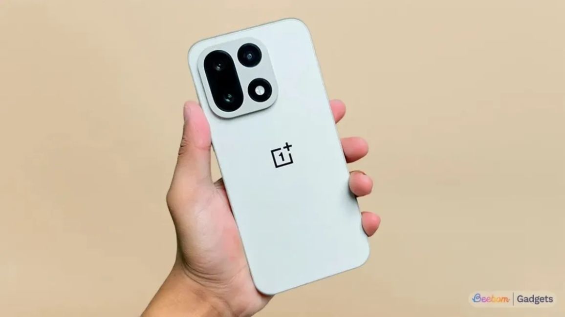 OnePlus 15 in hand shot with the Sandstorm colour option