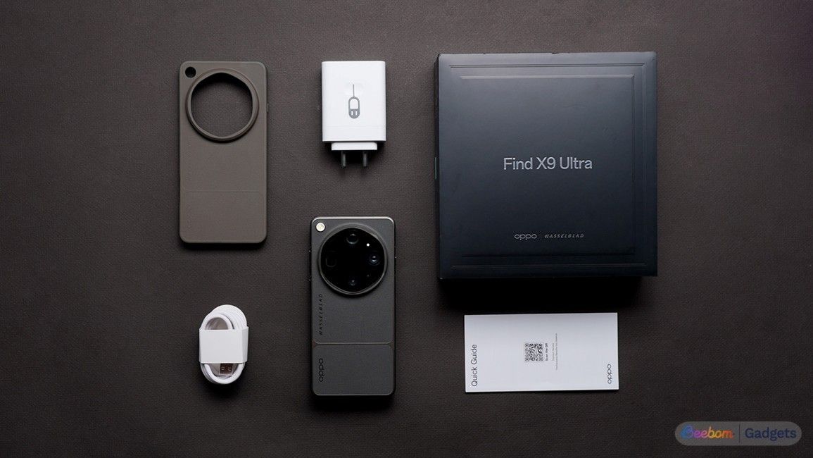 Oppo Find X9 Ultra box contents laid out against a black background