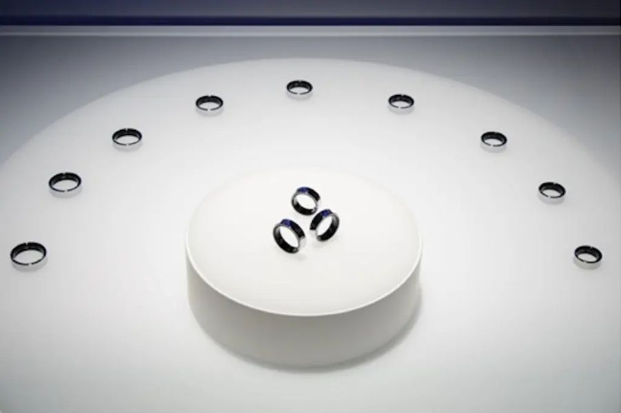 Samsung Galaxy Ring on a platform surrounded by more rings