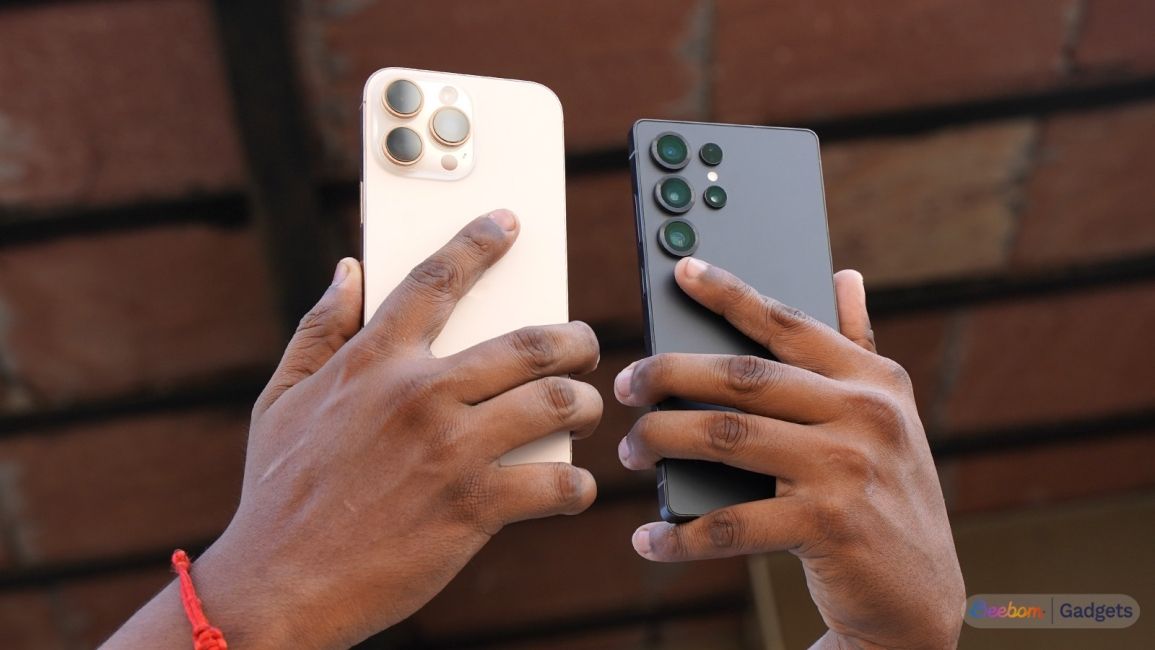 iPhone 15 Pro next to the Samsung Galaxy S24 Ultra in hands